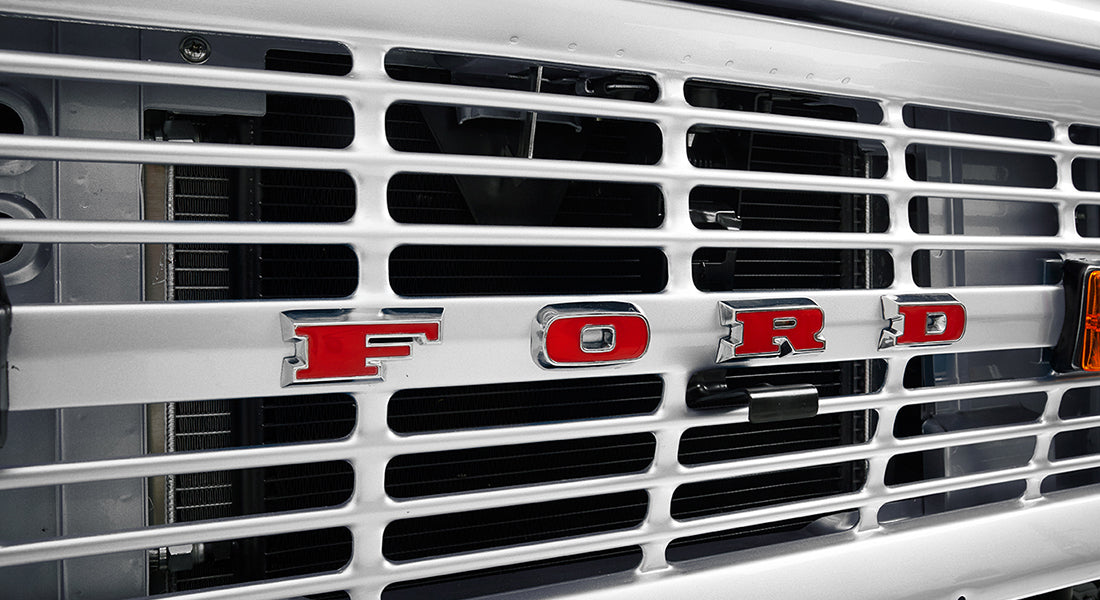 Front grille of Classic Ford Bronco with red FORD letters.