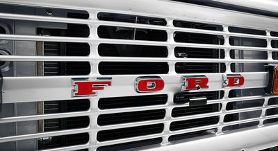 Front grille of Classic Ford Bronco with red FORD letters.