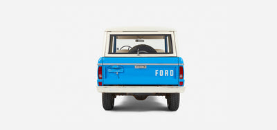 Rear view of Classic Ford Bronco with ford name on tailgate and white bumper