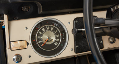 Classic Ford Bronco dashboard speedometer and gauges close-up