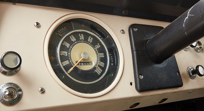 Speedometer and dashboard controls inside Classic Ford Bronco with odometer reading 78063
