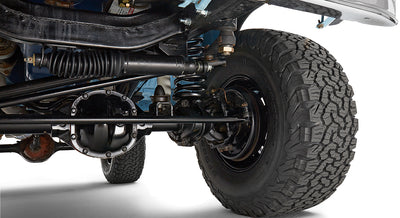 Undercarriage close-up of suspension and tire of Classic Ford Bronco