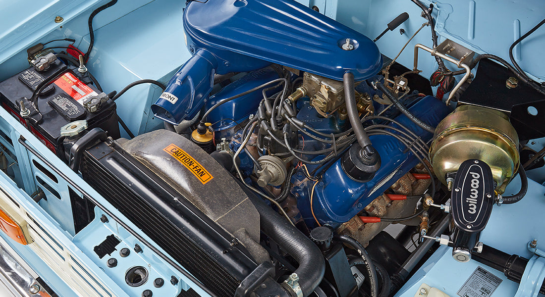 Close-up of Ford Bronco engine with blue air filter and various components