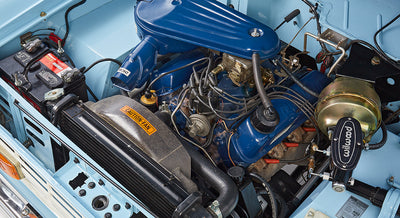 Close-up of Ford Bronco engine with blue air filter and various components