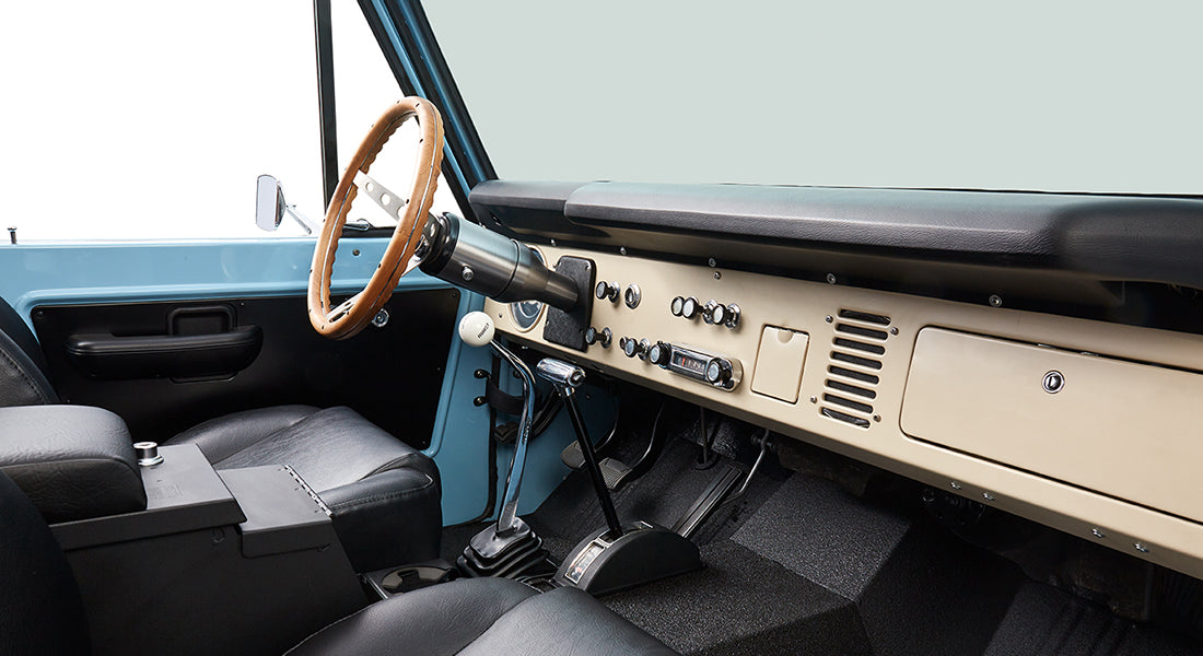 Dashboard and front seats with gear shifter inside Classic Ford Bronco