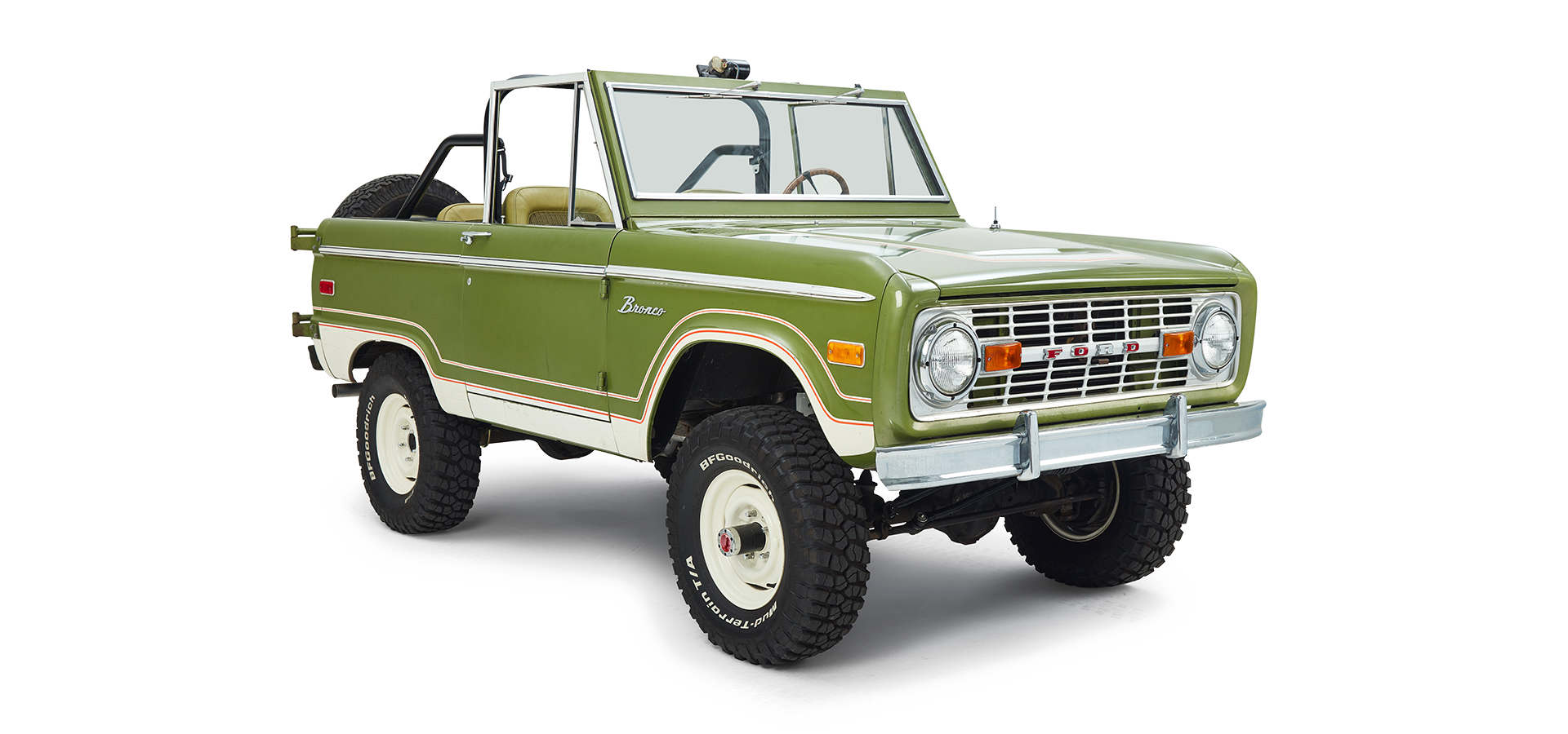 Three-quarter front view of a green and white Classic Ford Bronco with no roof and off-road tires.