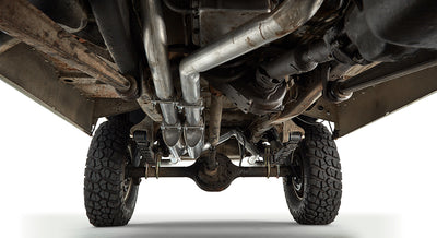Underneath view of the Classic Ford Bronco showing exhaust pipes and rear suspension