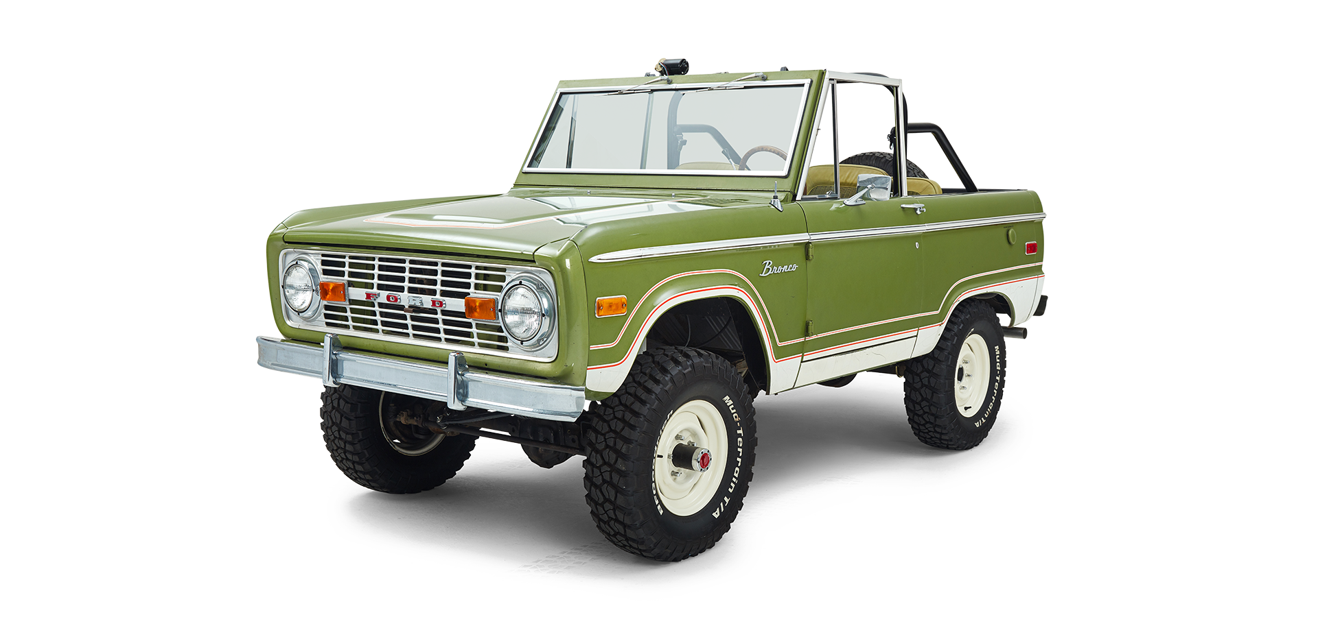 Three-quarter front view of a green and white Classic Ford Bronco angled to the left with no roof.