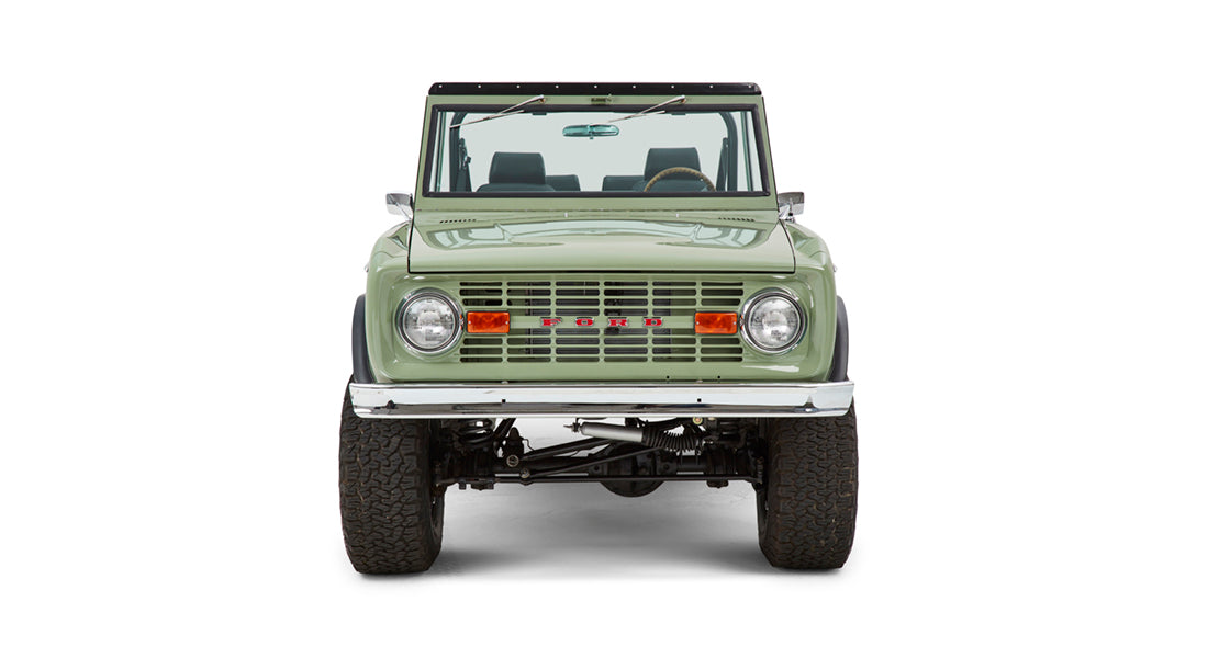 Front view of Classic Ford Bronco with windshield, mirrors, and roll bar visible