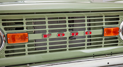 Green exterior side panel of Classic Ford Bronco with Sport Bronco emblem