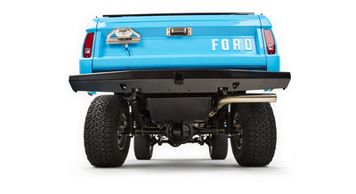 Underneath rear view of Classic Ford Bronco showing suspension, differential, and exhaust pipe