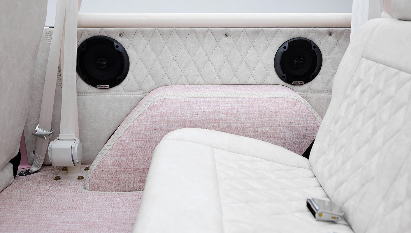 1966 Pink Classic Ford Bronco Coyote Series Roadster with White Leather Interior and Custom Pink Flooring