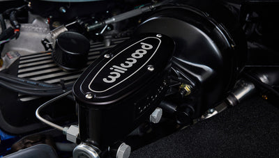 Close-up of black Wilwood component inside the engine bay of Classic Ford Bronco