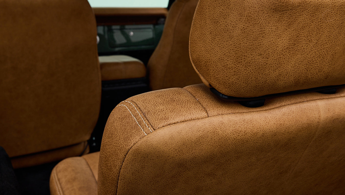 Close-up of a Kenwood car stereo unit inside a Classic Ford Bronco