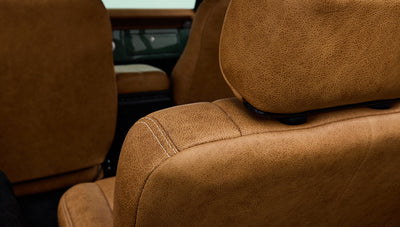 Close-up of a Kenwood car stereo unit inside a Classic Ford Bronco