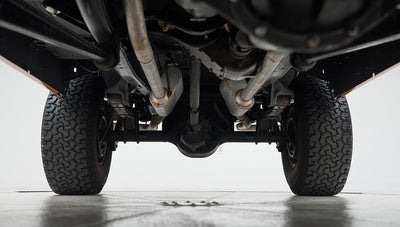Underside of axle and dual exhaust system of Classic Ford Bronco