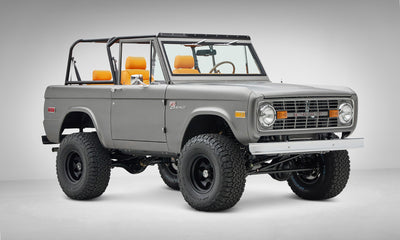 1972 classic ford bronco in matte silver over orange leather interior coyote series front passenger 3/4