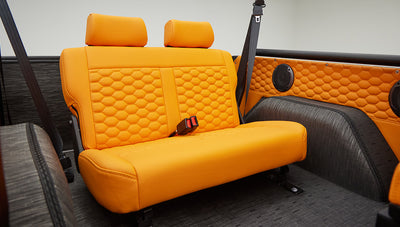 1972 classic ford bronco in matte silver with orange leather interior backseat