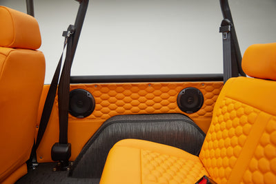 1972 classic ford bronco in matte silver with orange leather interior rear panel speakers