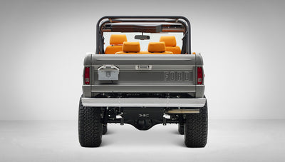 1972 Classic Ford Bronco in Matte Silver over Orange Leather interior rear end
