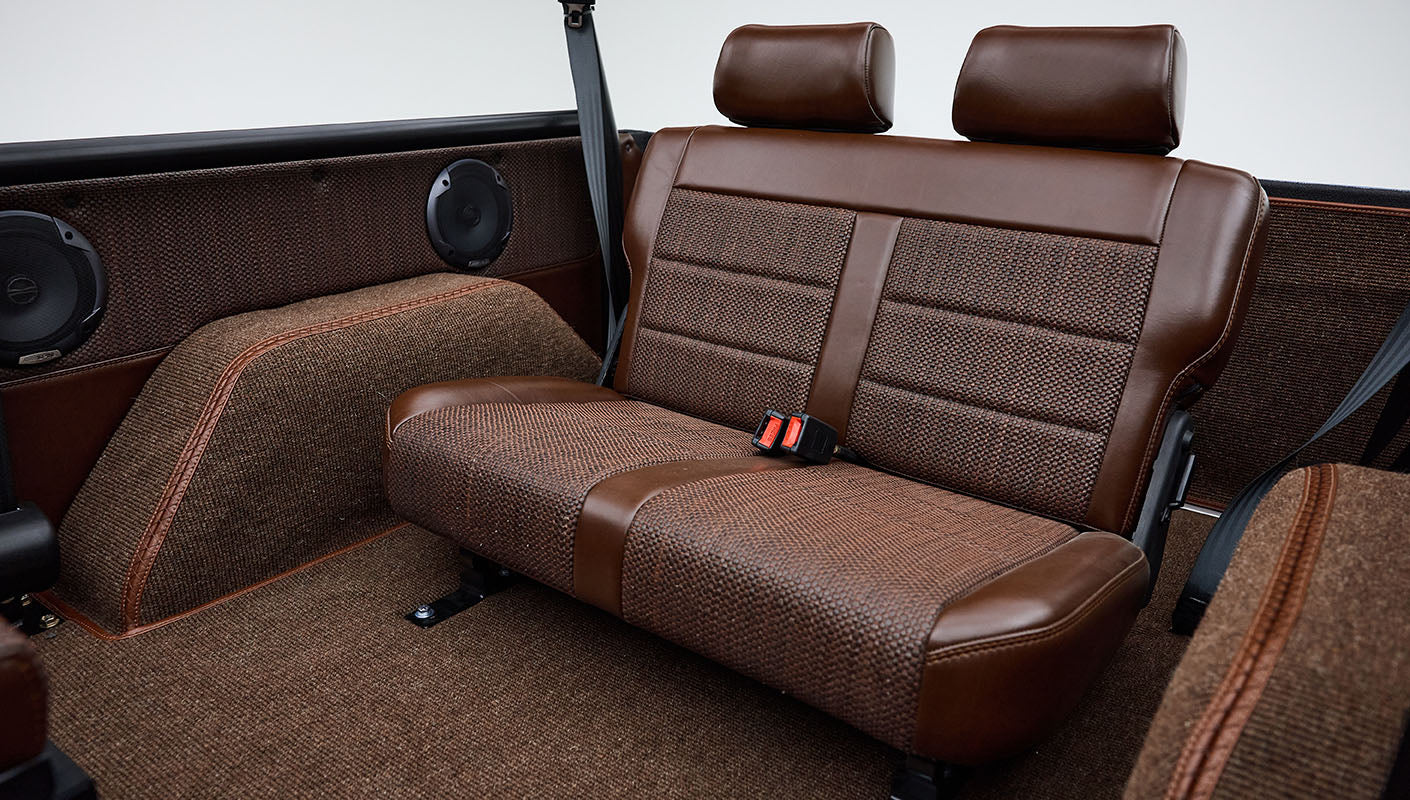 1974 Blue Classic Ford Broncos Coyote Series with custom leather interior, custom carpet and family roll cage