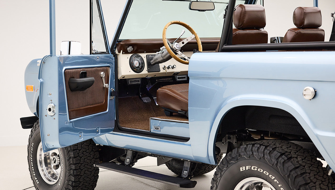 1974 Blue Classic Ford Broncos Coyote Series with custom leather interior, custom carpet and family roll cage