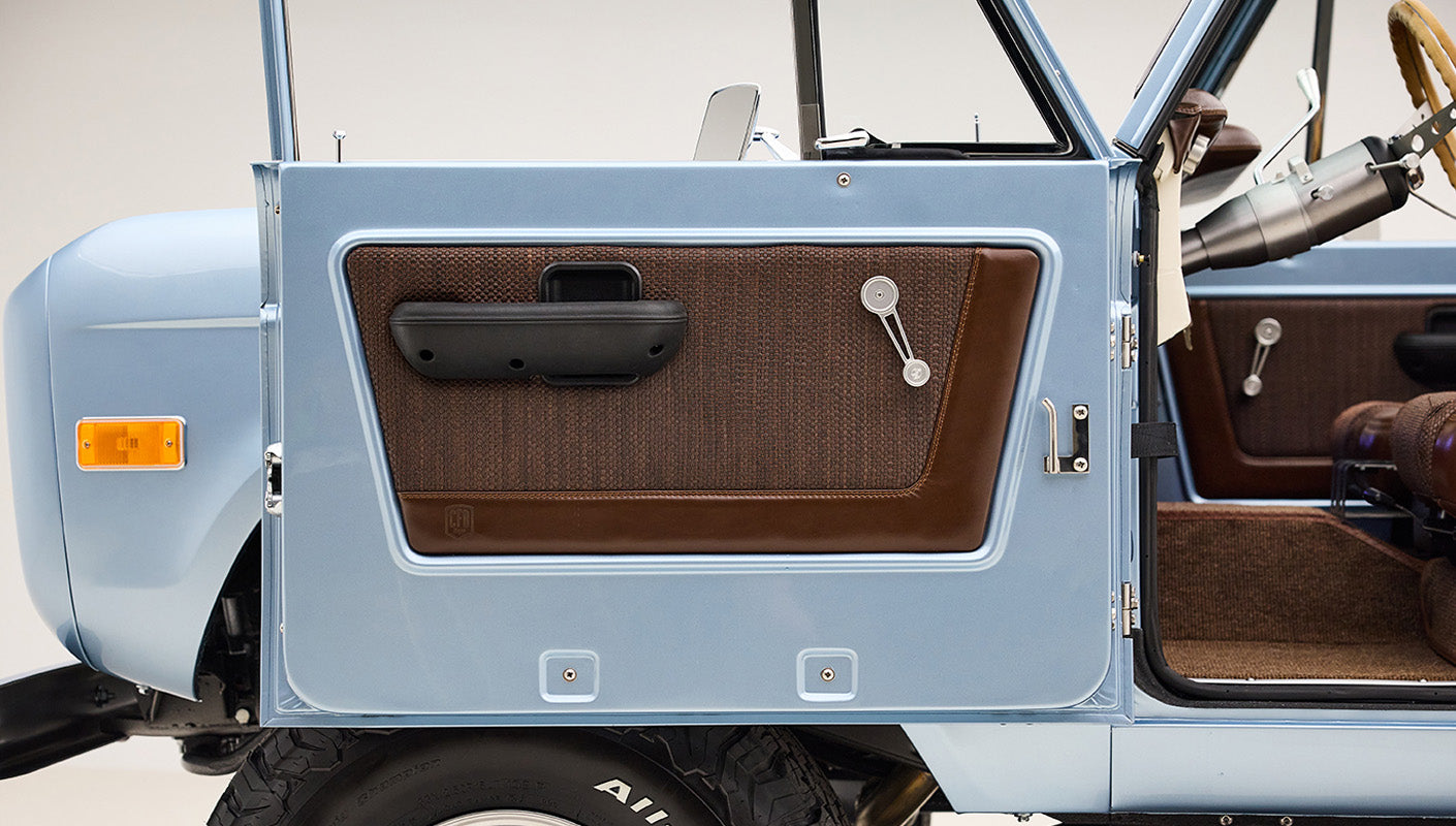 1974 Blue Classic Ford Broncos Coyote Series with custom leather interior, custom carpet and family roll cage