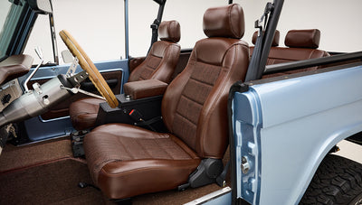 1974 Blue Classic Ford Broncos Coyote Series with custom leather interior, custom carpet and family roll cage