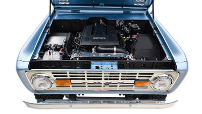 Classic Ford Bronco 1974 Blue Coyote Series engine visible under lifted hood