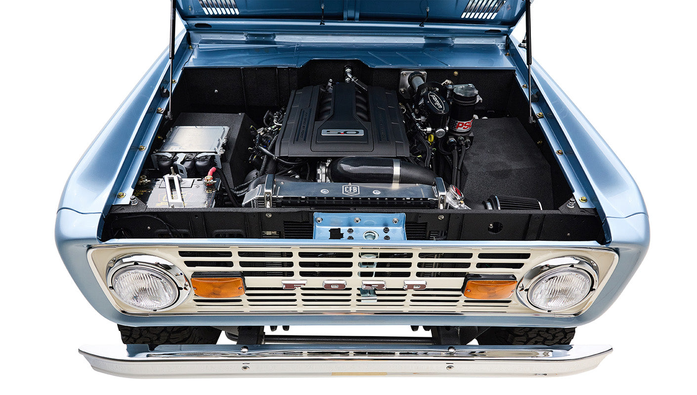 1974 Blue Classic Ford Broncos Coyote Series with custom leather interior, custom carpet and family roll cage