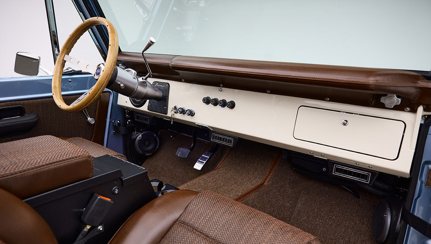1974 Blue Classic Ford Broncos Coyote Series with custom leather interior, custom carpet and family roll cage