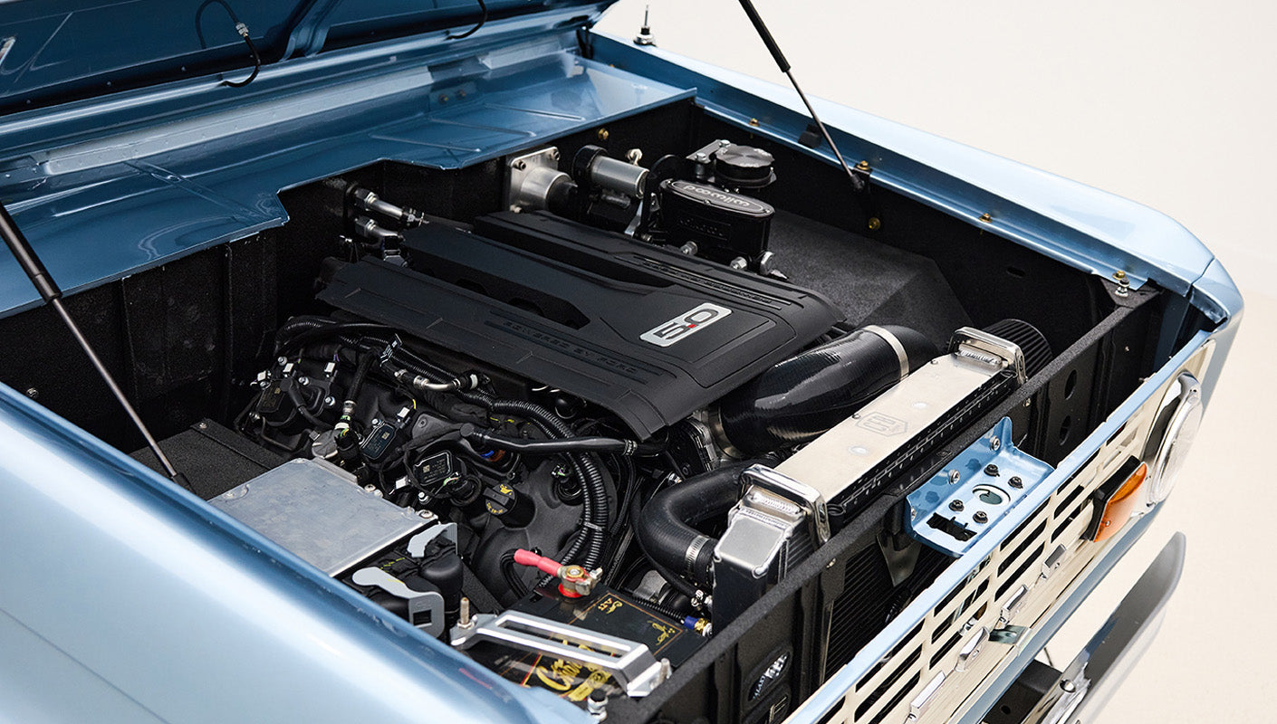 1974 Blue Classic Ford Broncos Coyote Series with custom leather interior, custom carpet and family roll cage
