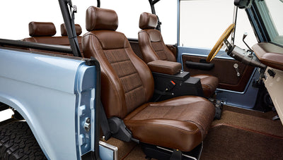 1974 Blue Classic Ford Broncos Coyote Series with custom leather interior, custom carpet and family roll cage
