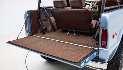 1974 Blue Classic Ford Broncos Coyote Series with custom leather interior, custom carpet and family roll cage