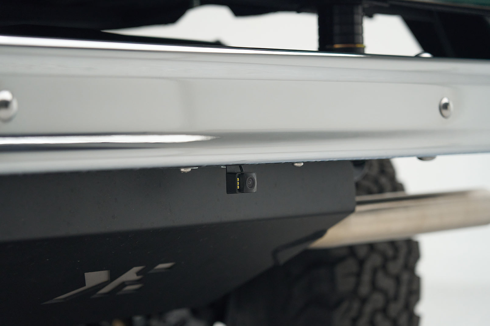 Backup camera mounted under rear bumper of a Ford Bronco