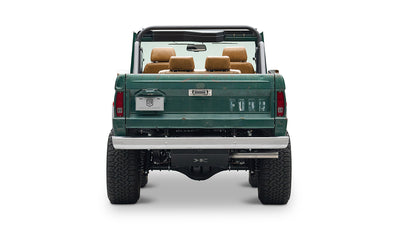 Classic Ford Bronco green, front view showing headlights and grill on white background
