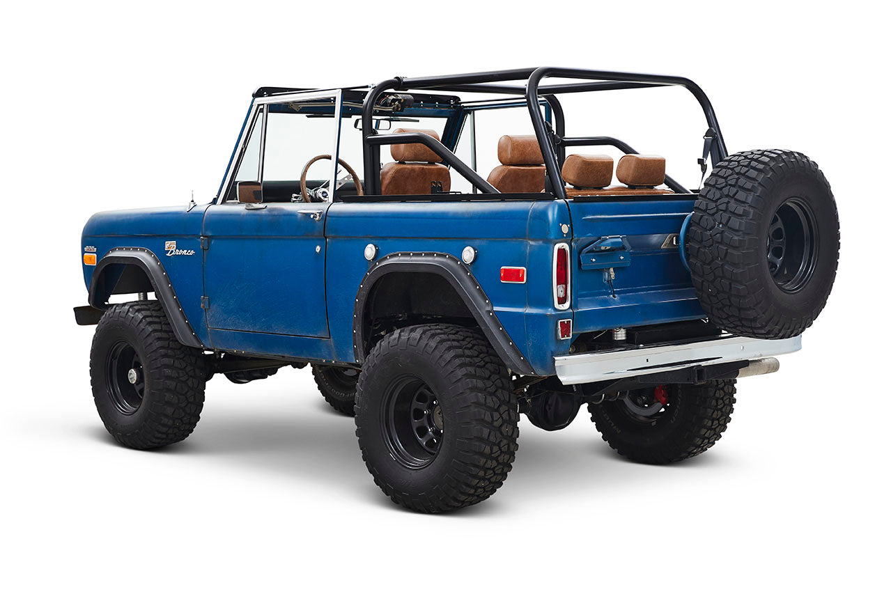 Rear three-quarter view of Classic Ford Bronco with spare tire mounted on back