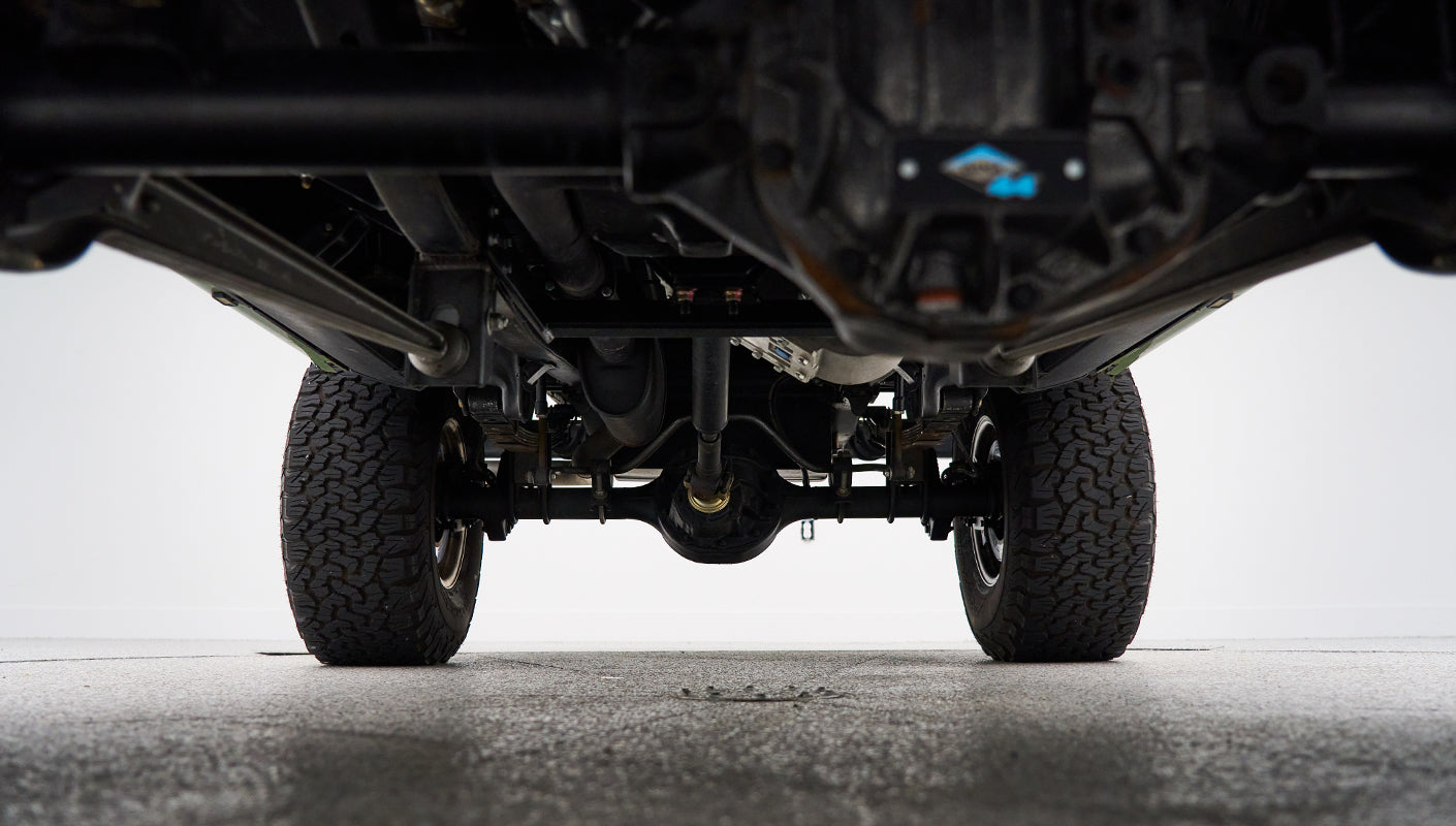 Undercarriage view focusing on rear axle and suspension components of Classic Ford Bronco