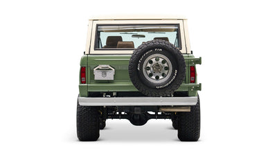 Classic Ford Bronco in boxwood green with white roof, rear profile centered on white background.