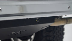 Rear underside of Classic Ford Bronco showing a small black backup camera mounted on the bumper