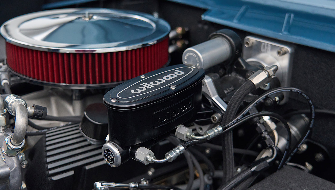 Close-up on Wilwood branded component in the engine bay of a Classic Ford Bronco