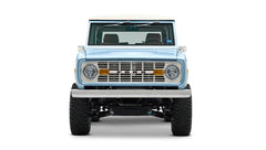 Front view of Classic Ford Bronco Brittany Blue with white hardtop and chrome front bumper