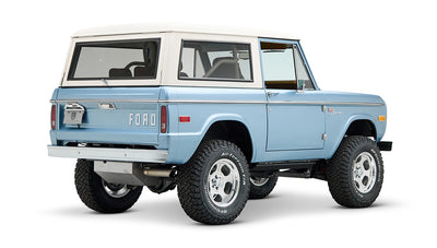 Classic Ford Bronco Brittany Blue with white hardtop viewed from rear side angle