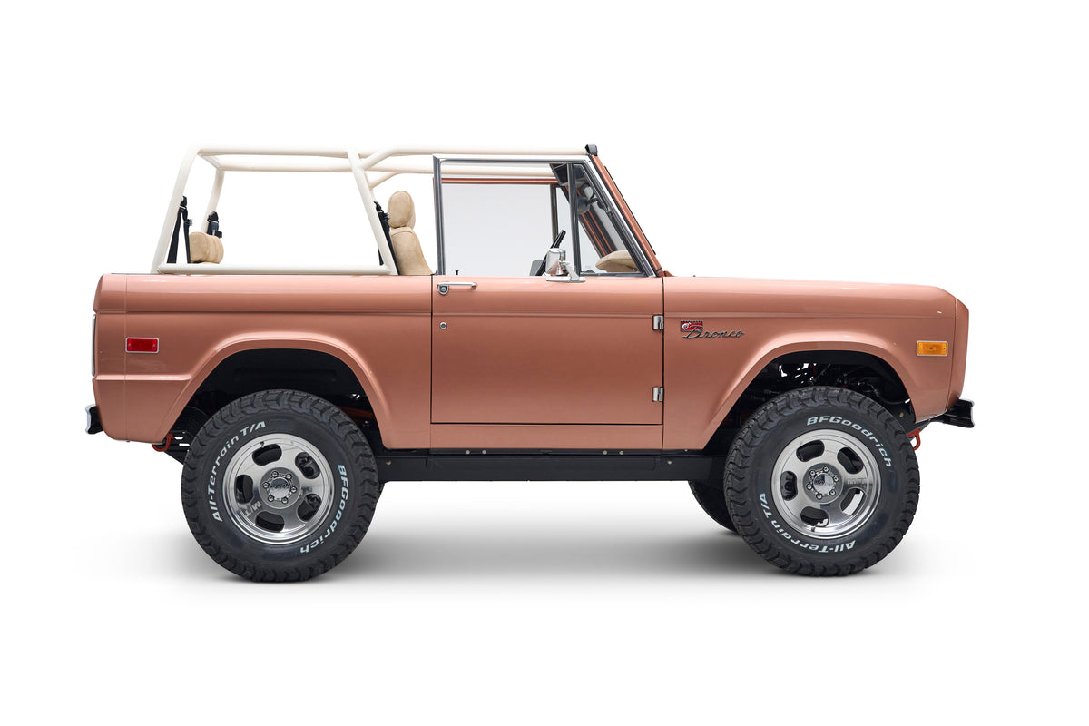Side profile of Classic Ford Bronco with raised suspension and off-road tires