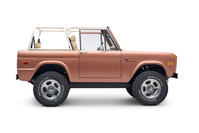 Side profile of Classic Ford Bronco with raised suspension and off-road tires