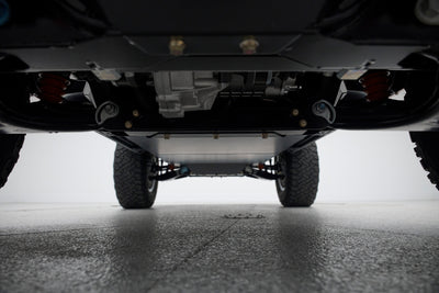 Underside view of Classic Ford Bronco showing chassis and suspension parts