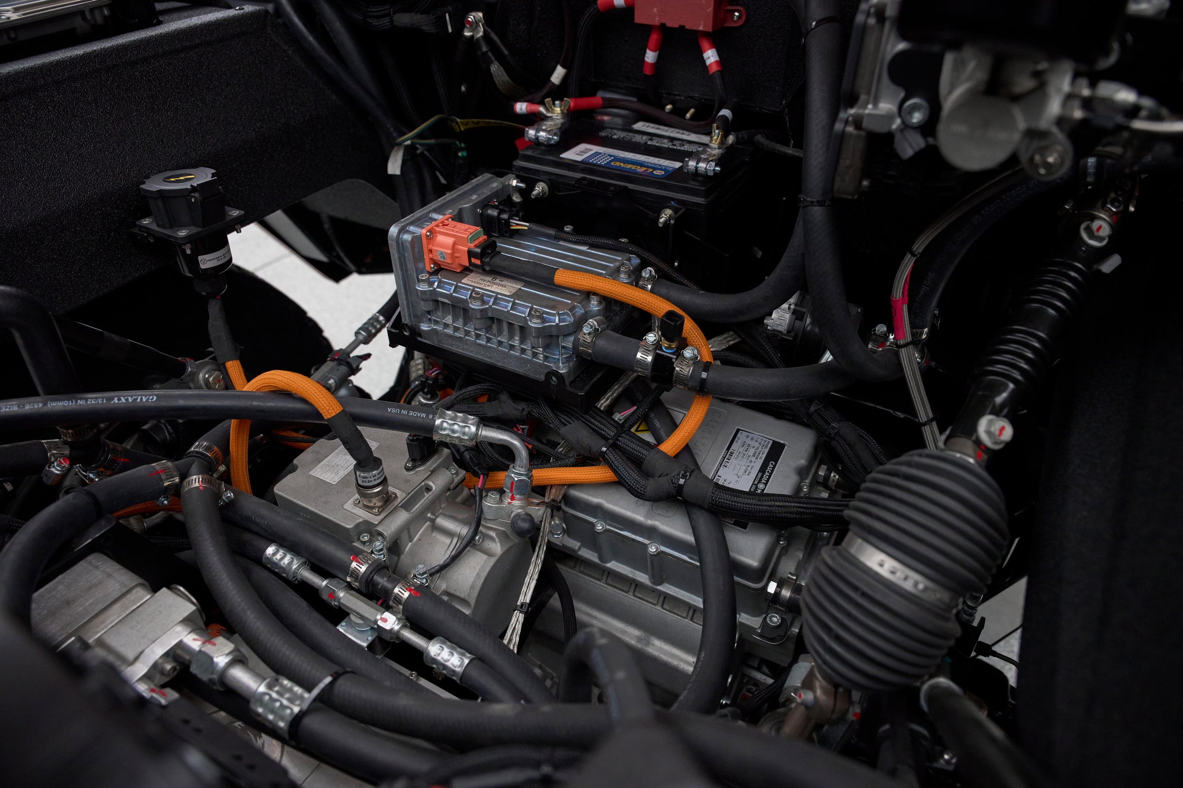 Close-up of Classic Ford Bronco electric drivetrain and wiring in the engine bay