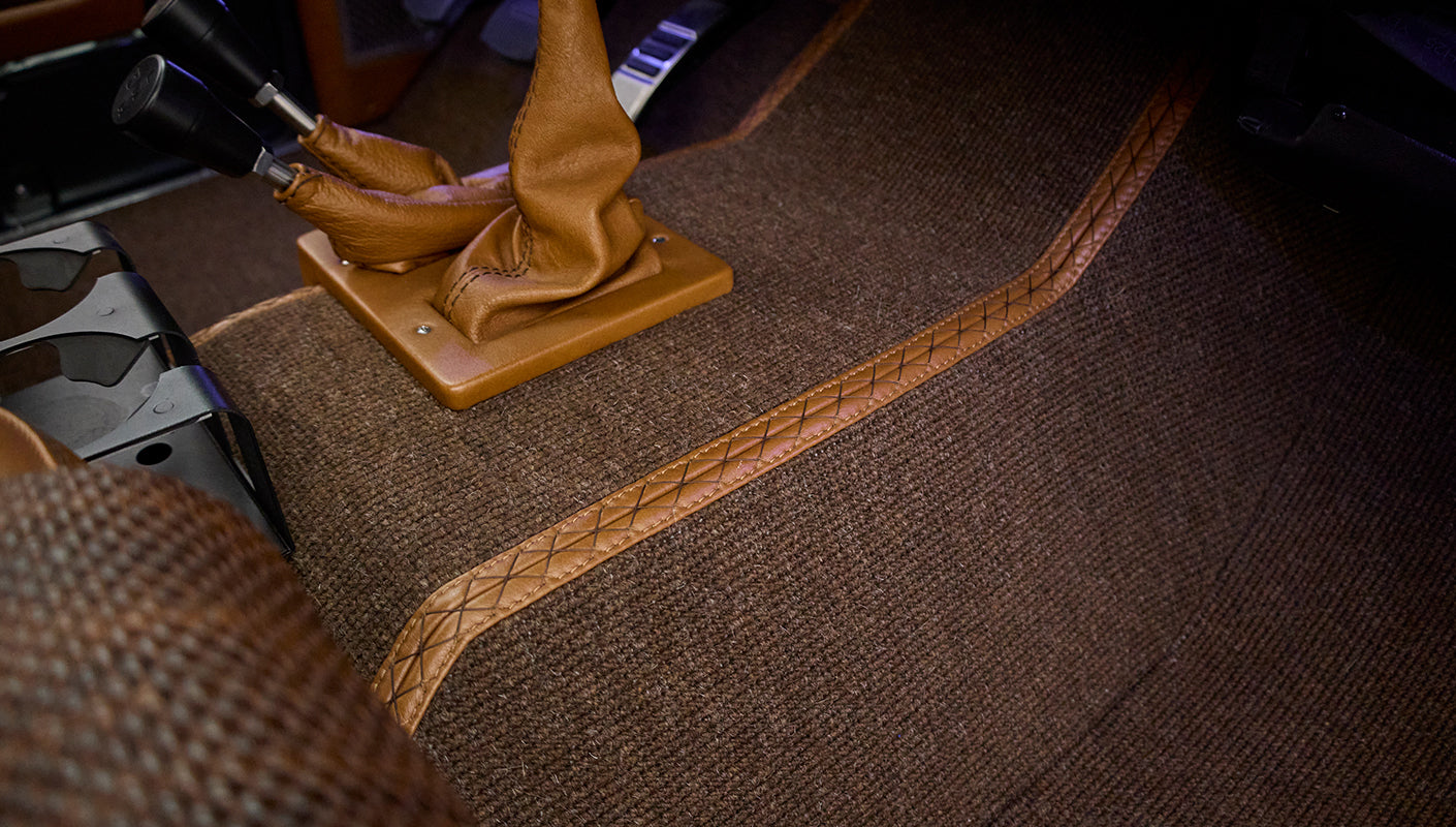 Floor carpet and leather shift boots inside Classic Ford Bronco