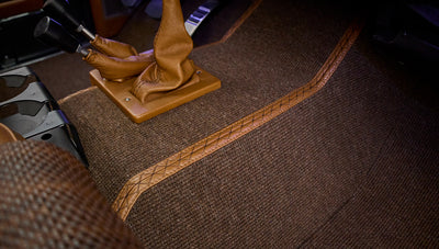 Floor carpet and leather shift boots inside Classic Ford Bronco