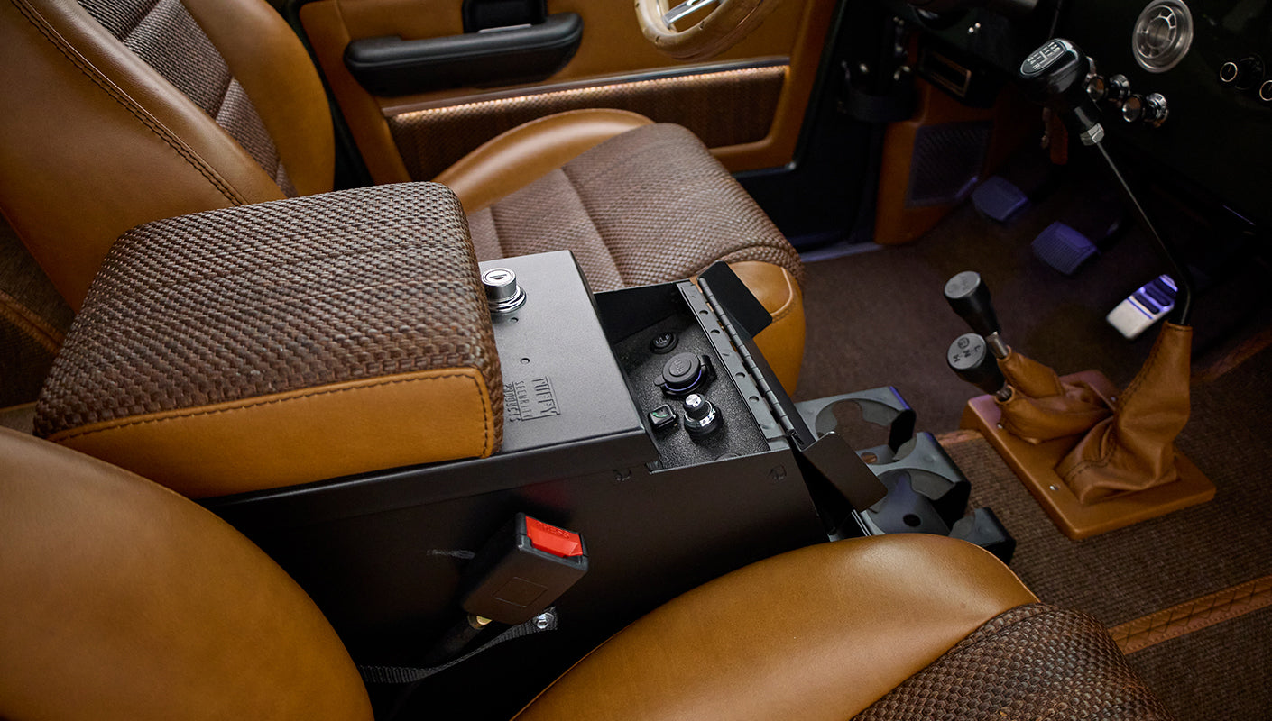 Center console and gear shifters between front seats of Classic Ford Bronco